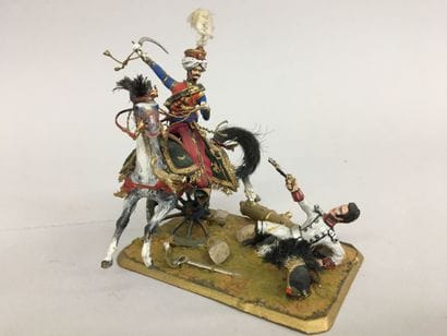 2 petits dioramas avec figures ronde bosse,...