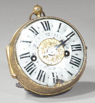 Montre oignon, en laiton ou bronze ajouré...