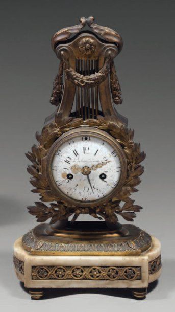 Petite pendule lyre, en bronze ciselé et...