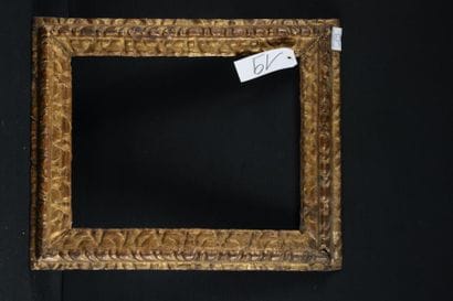 Cadre en bois sculpté et doré – XVIIIème...