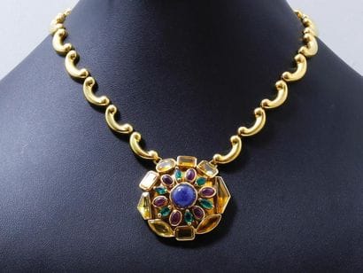 Collier articulé en or 750 millièmes, composé...