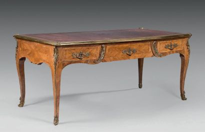 Bureau plat marqueté en quartefeuilles de...