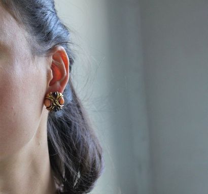 **Paire de boucles d'oreilles de forme ronde...