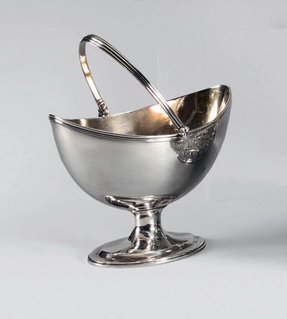Oval cup in plain silver, with handle, resting...