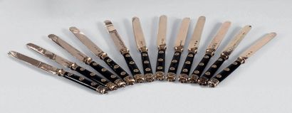 Twelve fruit knives in 950 thousandths vermeil,...
