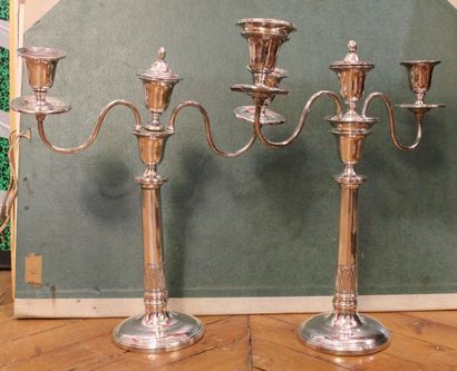 Pair of silver plated metal torches forming...