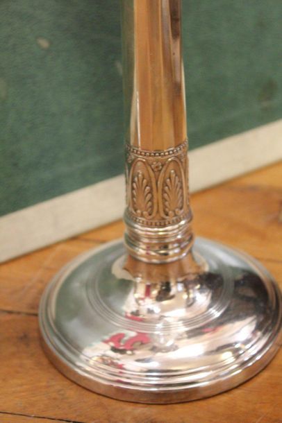 Pair of silver plated metal torches forming...