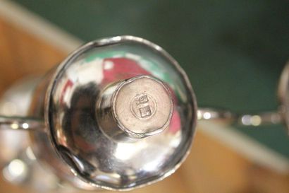 Pair of silver plated metal torches forming...