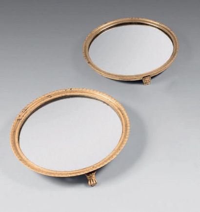 Two round gilt bronze highlights decorated...