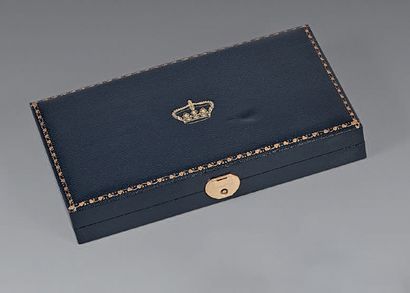 Small rectangular silver tray with a medal...