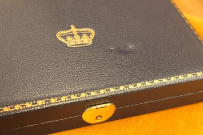 Small rectangular silver tray with a medal...