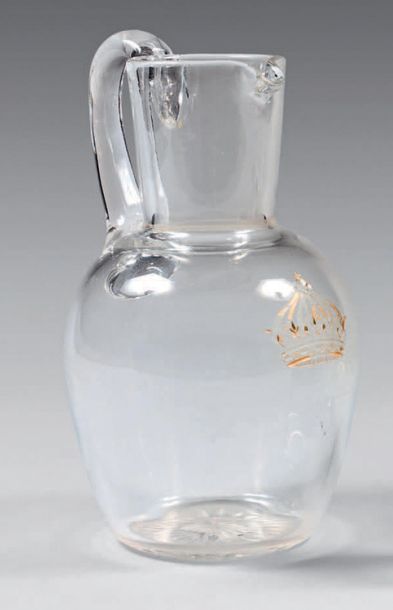 Small glass jug with handle, engraved with...