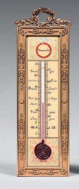 Alcohol thermometer in a gilt bronze frame...