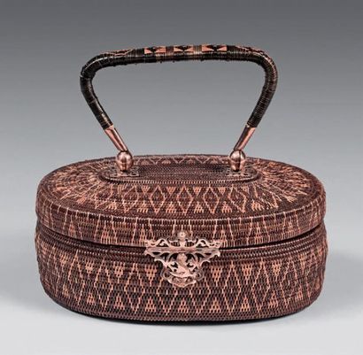 Small woven straw basket with openwork gilded...