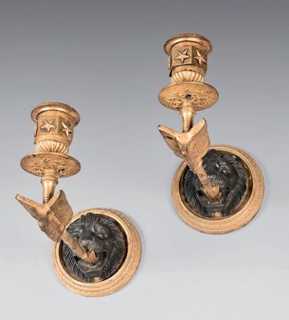 Pair of ormolu and patinated bronze sconces...
