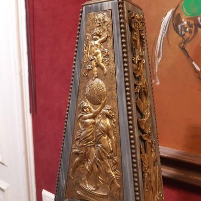 Large obelisk-shaped clock in turquoise blue...