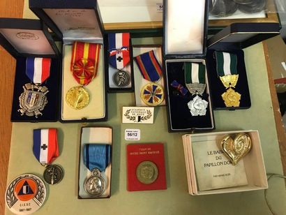 Set of twelve medals and insignia:
- Gold...