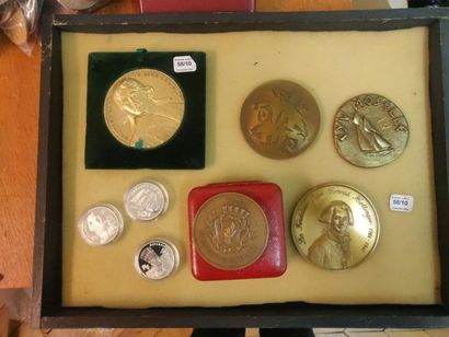 Set of seventeen bronze table medals: 