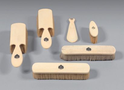 Toiletries kit including: two hairbrushes,...
