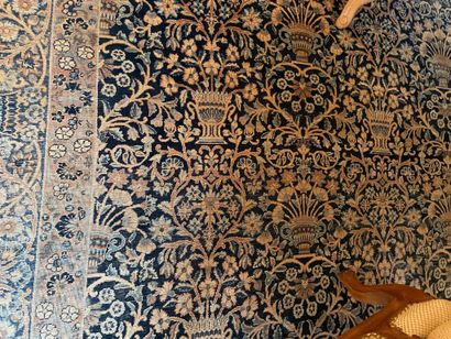 
Large Persian carpet decorated with potiches...