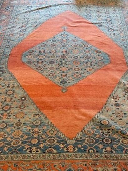 
Oriental carpet with a central medallion...