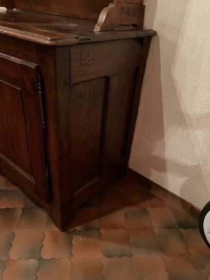 Moulded oak sideboard opening with two doors....