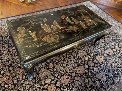 Black lacquered wood coffee table with characters...