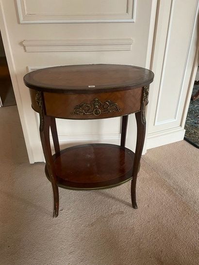
Oval coffee table in veneer and marquetry...