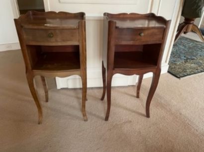 
Pair of walnut bedside tables with niche,...