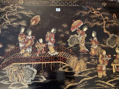 Black lacquered wood coffee table with characters...