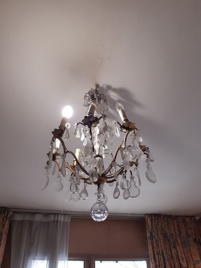 Eight-light bronze chandelier with pendants.
Height:...
