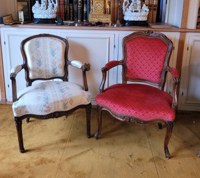 TWO cabriolet armchairs in carved natural...