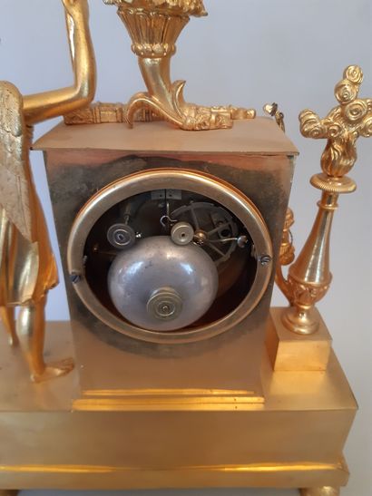 Gilt bronze PENDULE decorated with Apollo.
Empire...