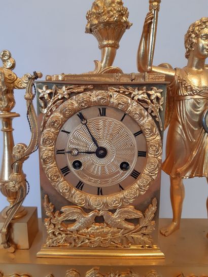 Gilt bronze PENDULE decorated with Apollo.
Empire...