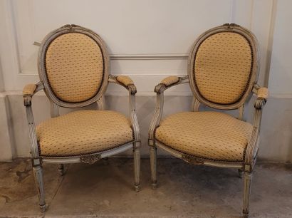 PAIR OF ARMCHAIRS in the Louis XVI style...