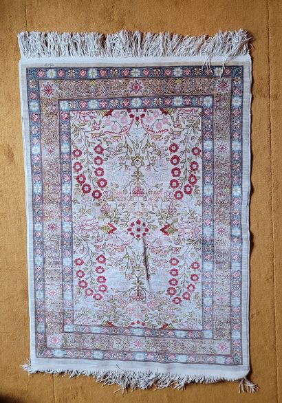 LOT OF FIVE wool and silk Hereke RUGS, one...