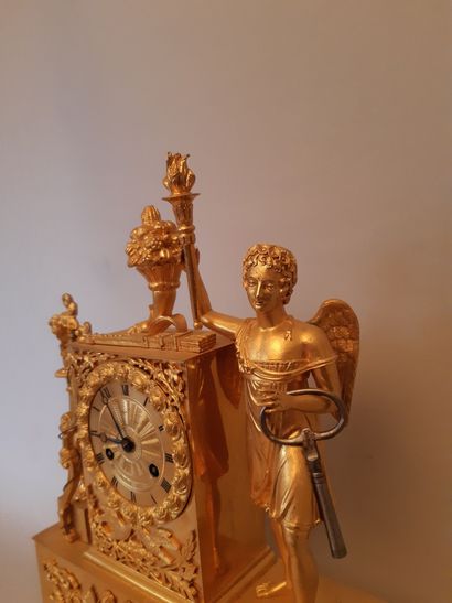 Gilt bronze PENDULE decorated with Apollo.
Empire...