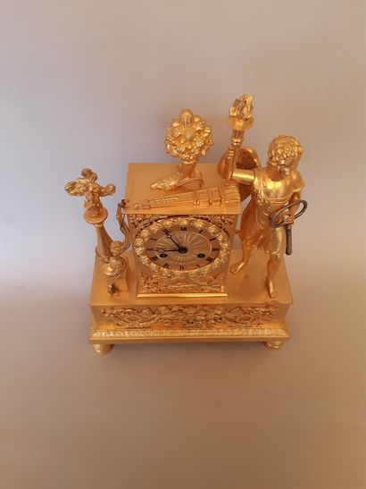 Gilt bronze PENDULE decorated with Apollo.
Empire...