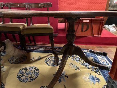 Mahogany DINING TABLE on two fluted tripod...