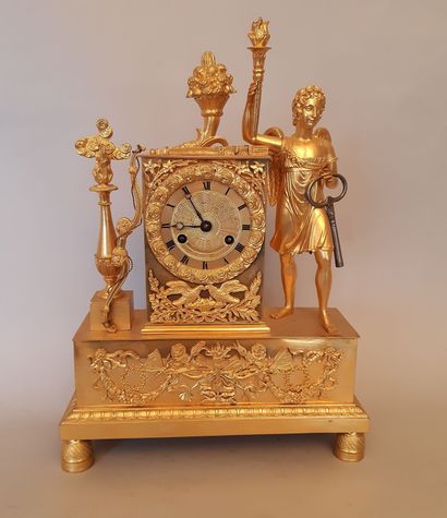 Gilt bronze PENDULE decorated with Apollo.
Empire...
