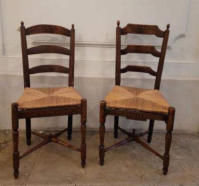 Pair of straw chairs.