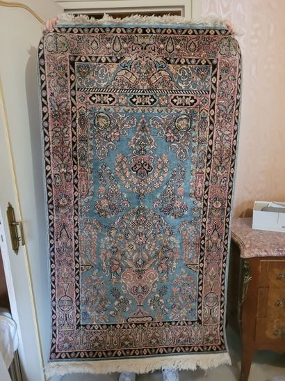 THREE ORIENTAL RUGS, two decorated with a...