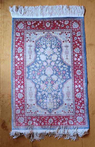 LOT OF FIVE wool and silk Hereke RUGS, one...