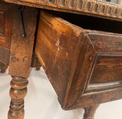 Octagonal walnut table opening with four...