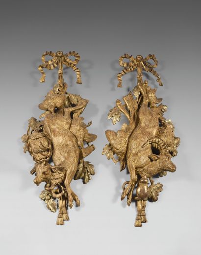 Two large gilded wood sconces carved with...