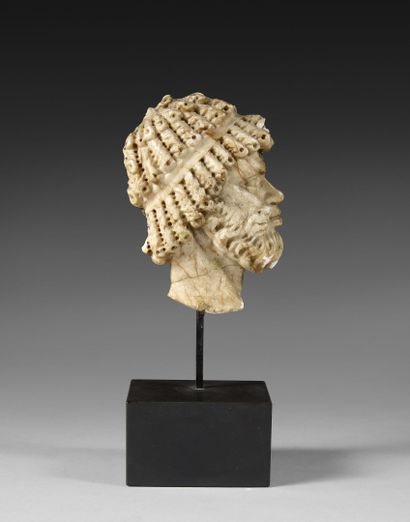 Antique-style bearded Nubian head, in profile...
