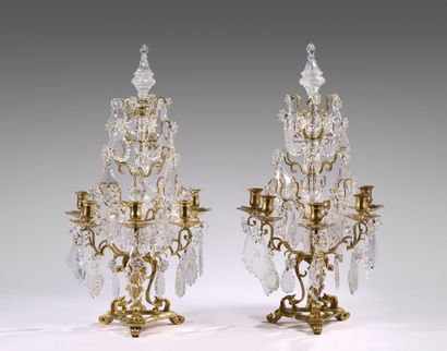 Pair of five-light ormolu wall sconces adorned...