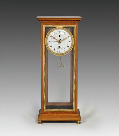 Regulator clock in a mahogany cage frame...