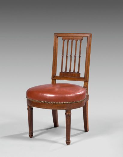 Mahogany low chair with openwork grill back....