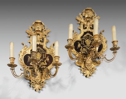 Pair of three-light sconces in chased ormolu...